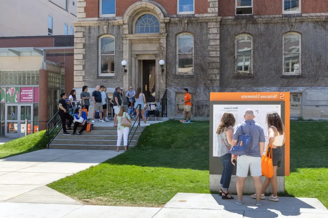 People standing outside a building.